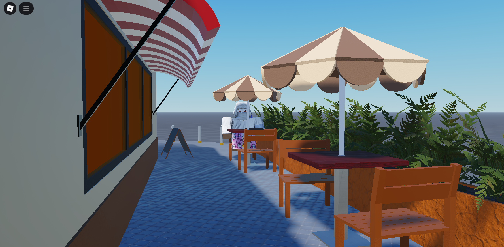 Interior de una cafetería en Roblox con mesas