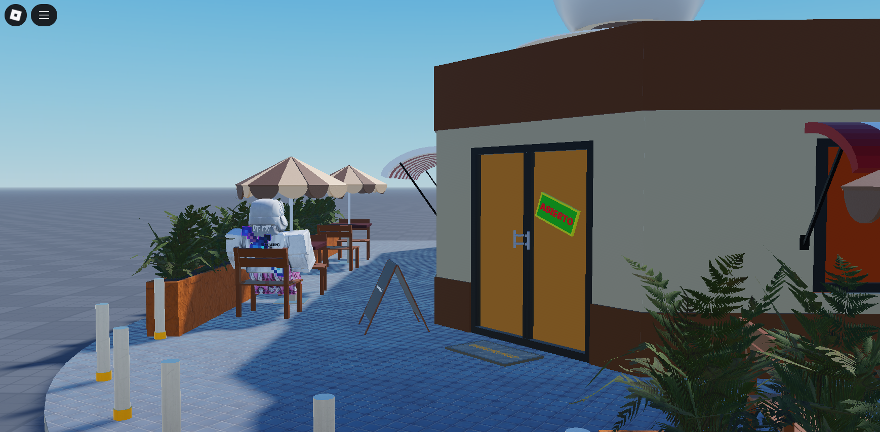 Zona de asientos en una cafetería de Roblox